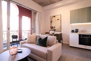 Η κουζίνα ή μικρή κουζίνα στο ONEHUNDRED on M - Fluent Serviced Apartments