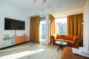 Μια τηλεόραση ή/και κέντρο ψυχαγωγίας στο AboutArtApartments - Krzywoustego