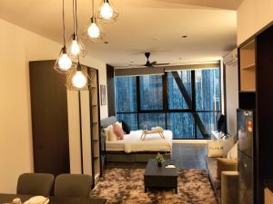 Et opholdsområde på Hospitality Service Suites Scarlitz KLCC + 96 billeder