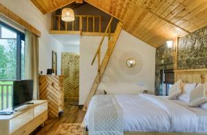 Postel nebo postele na pokoji v ubytování Pitaara Cottage + 67 fotografií