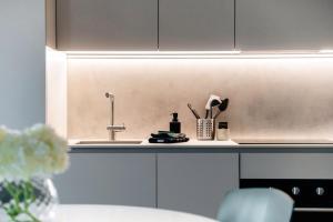 Kuchyň nebo kuchyňský kout v ubytování Loft Monti by Quokka 360 - A 10 min walk from the Como's centre