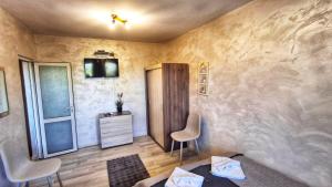 TV a/nebo společenská místnost v ubytování Hotel & Restaurant Kotel