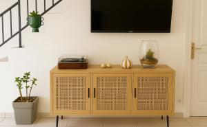 TV a/nebo společenská místnost v ubytování La Maison accueillante pour les pros et tourisme