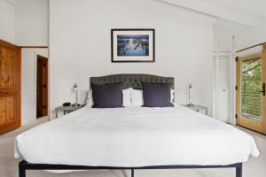 Postel nebo postele na pokoji v ubytování RMR: Bridger Chalet House in Teton Village