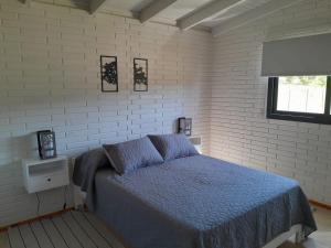 Postel nebo postele na pokoji v ubytování Aire Serrano