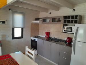 Kuchyň nebo kuchyňský kout v ubytování Aire Serrano