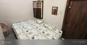 Ένα ή περισσότερα κρεβάτια σε δωμάτιο στο Family Room Bed Size 9x6 +11 φωτογραφίες