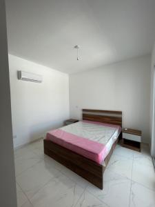 Ένα ή περισσότερα κρεβάτια σε δωμάτιο στο Eleftheriou Court