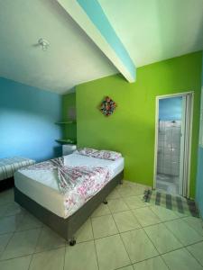 Postel nebo postele na pokoji v ubytování Pousada Brisa do Mar