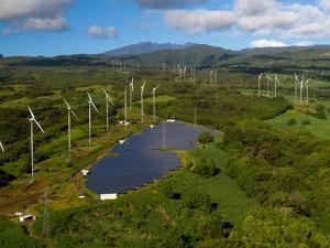 an aerial view of a bunch of wind turbines at Le Cocon de Bagatelle in Sainte-Suzanne