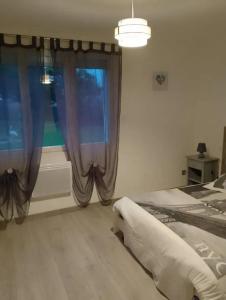 Postel nebo postele na pokoji v ubytování Appartement cosy avec jardin à Cayeux-sur-Mer 28 m²