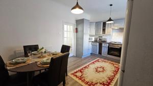 a kitchen and dining room with a table and chairs at Ushaw HillTop View in Ushaw Moor