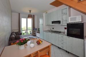 Kuchyň nebo kuchyňský kout v ubytování Iris