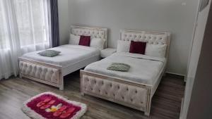 Ένα ή περισσότερα κρεβάτια σε δωμάτιο στο HK Villas +11 φωτογραφίες