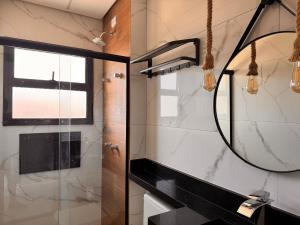 Ένα μπάνιο στο Suítes de Ubatumirim +28 φωτογραφίες