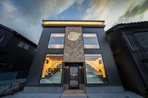 a building with a sign on the side of it at DS2&3 - Vacation STAY 62445v in Tajiri