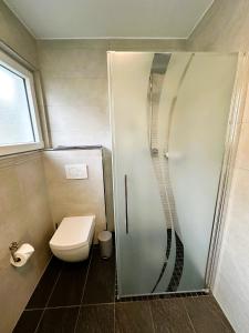 Koupelna v ubytování Fewo Himmelblau + 36 fotografií