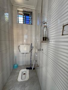 Φωτογραφία από το άλμπουμ του Q Homes Platinum Suite σε Μουάνζα