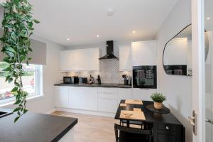Η κουζίνα ή μικρή κουζίνα στο High Street Retreat