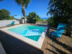 Bazén v ubytování Villa crecerelles - maison manapany Saint-Joseph nebo v jeho okolí