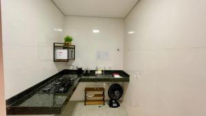 O bucătărie sau chicinetă la Hospedaria Central