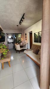 Φωτογραφία από το άλμπουμ του Apartamento com dois quartos a 300m da praia σε Cabedelo