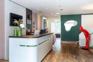 Μια τηλεόραση ή/και κέντρο ψυχαγωγίας στο ACHAT Hotel Dresden Elbufer