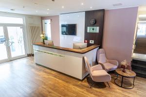 Μια τηλεόραση ή/και κέντρο ψυχαγωγίας στο ACHAT Hotel Dresden Elbufer