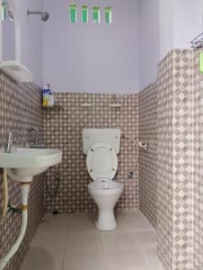 Koupelna v ubytování StudioStay at Ajem-Lar Homestay