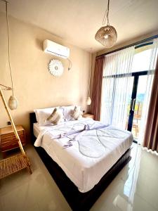 Ένα ή περισσότερα κρεβάτια σε δωμάτιο στο Pinggan heaven +24 φωτογραφίες