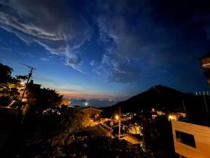 a view of a city at night at 九份玩具屋 in Ruifang