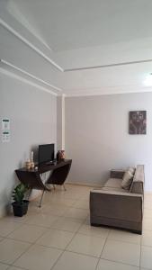 TV a/nebo společenská místnost v ubytování Apartamento Dúplex em Flecheiras