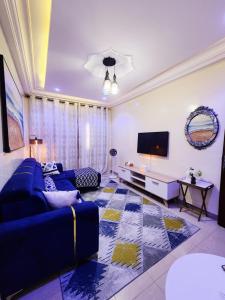 TV a/nebo společenská místnost v ubytování Studio Meublé au rez de chaussée avec toutes les commodités dans le quartier