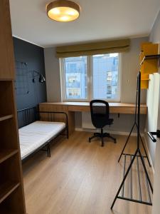 Ένα ή περισσότερα κρεβάτια σε δωμάτιο στο Apartament Alicja