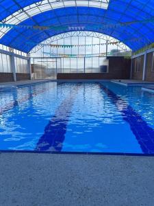 Bazén v ubytování Eco hotel finca porvenir nebo v jeho okolí