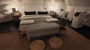 Postel nebo postele na pokoji v ubytování L'camp and cafe' Kohchang