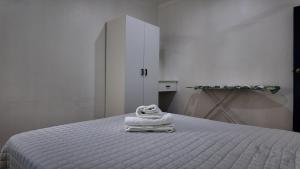 Postel nebo postele na pokoji v ubytování Jetsetter's Haven