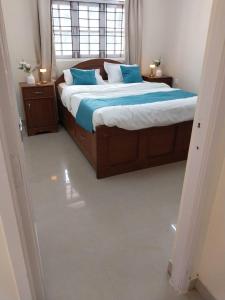 Postel nebo postele na pokoji v ubytování Goa Beach Apartment