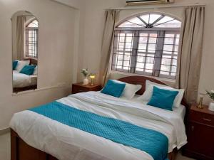 Postel nebo postele na pokoji v ubytování Goa Beach Apartment