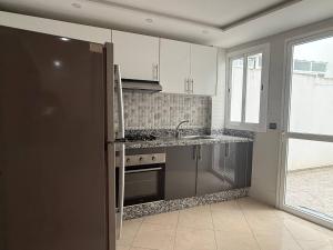 Kuchyň nebo kuchyňský kout v ubytování Appartement corniche sebou