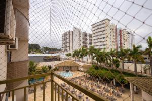 a view of a resort with a pool and buildings at DIROMA EXCLUSIVE - BVTUR in Caldas Novas