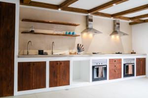 Η κουζίνα ή μικρή κουζίνα στο Bucio Coliving