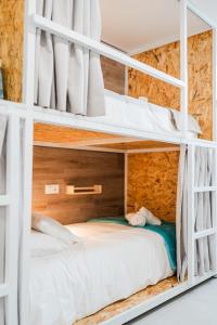 Ένα ή περισσότερα κρεβάτια σε δωμάτιο στο Bucio Coliving