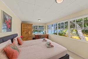 Postel nebo postele na pokoji v ubytování Villa Seaside Boca Sami