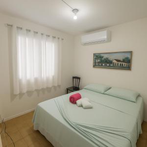 Postel nebo postele na pokoji v ubytování Casa Maré - a 1 min da praia