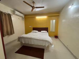 Ένα ή περισσότερα κρεβάτια σε δωμάτιο στο Hygge suites