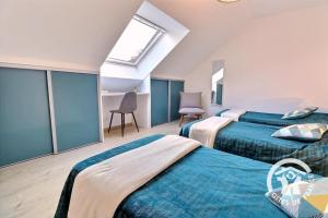 Ένα ή περισσότερα κρεβάτια σε δωμάτιο στο La rosalie