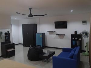 TV a/nebo společenská místnost v ubytování Coconoi Residence