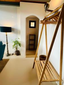 a room with a bunk bed and a ladder at Mas des Branches d'Or in Cavaillon