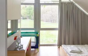 Ένα ή περισσότερα κρεβάτια σε δωμάτιο στο Nice Home In Röbel With Sauna +6 φωτογραφίες